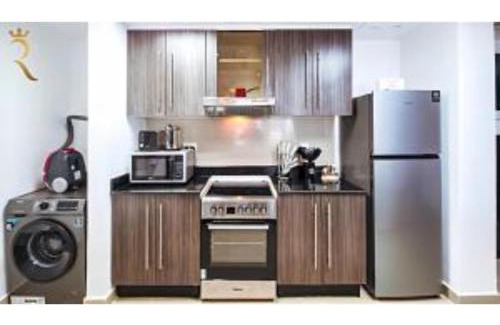 Abu Dhabi Apartment | Roxen Haven 1BR - Cozy Poolside Comfort Near Al Reef Beach
