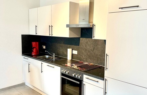 Niederemmel Apartment | Ruhige Ferienwohnung mit Garten im Erdgeschoss