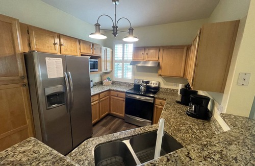 Kissimmee Condo | Runaway Beach Resort: Lakeview Condo with Patio, Pet Friendly