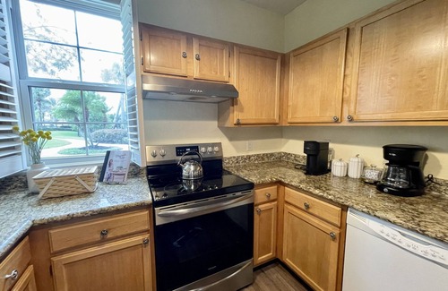 Kissimmee Condo | Runaway Beach Resort: Lakeview Condo with Patio, Pet Friendly