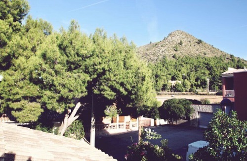 Colonia de Sant Pere House | Rustic stone house with mountain and beach views with air conditioning