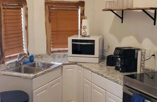Tulsa Cabin | Rustic Tiny Cabin with private hot tub 7mins from downtown