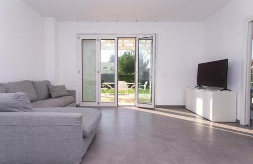Sirolo Apartment | S018 - Sirolo, nuovissimo trilocale in pietra con giardino dx