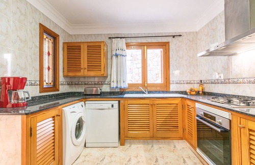 Cala Santany Apartment | Sa Trona Beach House holiday getaway with views of Cala Santanyí just steps from the beach