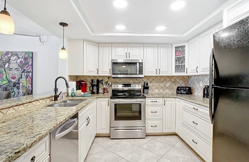 Indian Shores Condo | Sand Castle III # 203 DIRECT GULF FRONT Condo Private Staircase to Pool & MORE
