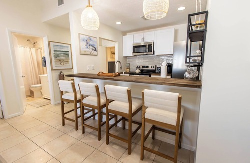 Historic Seaport Apartment | Sandbar Suite | 2 bed/2 bath apartment with patio overlooking Front Street