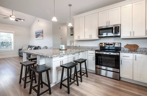 Carova Beach House | Sandy Adventures!nThird row from the ocean!nWild Horses roam the area- Carova
