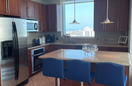 South Padre Island Condo | Sapphire gem: Stunning Bay and Gulf views at the island's only 5 Star property.