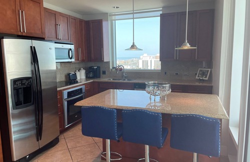 South Padre Island Condo | Sapphire gem: Stunning Bay and Gulf views at the island's only 5 Star property.