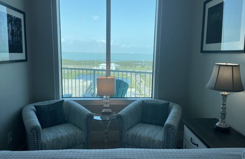 South Padre Island Condo | Sapphire gem: Stunning Bay and Gulf views at the island's only 5 Star property.