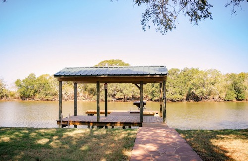 Cedar Lane House | SARGENT, TX Spacious, Creekfront Home, Amazing Outdoor Space & 2 Fishing Piers.