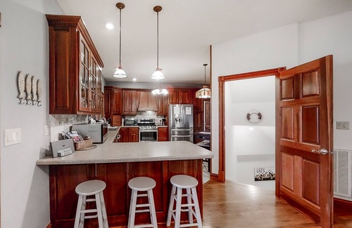Rock Harbor House | Scenic 6BR lakefront home in cove with private dock, boat slips, hot tub-Dogs ok