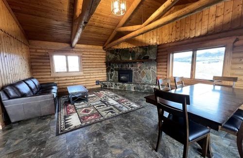 Ennis House | Scenic Vacation Home with Wrap-Around Deck Overlooking Ennis Lake near McAllister, Montana
