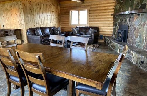 Ennis House | Scenic Vacation Home with Wrap-Around Deck Overlooking Ennis Lake near McAllister, Montana