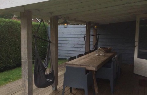 Breskens House | Schoneveld 163 of type Duinroos located at the Schoneveld holiday park a cosy and affordable holiday home. Duinroos is a charming holiday home with large windows that always give you the idea that you are in the garden.
