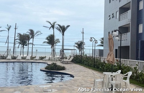 Mongagua Apartment | Seafront apartment with barbecue on the balcony and swimming pool