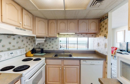 Bethany Beach Condo | Sea Colony 6th floor condo w/shared gym, basketball court - partial ocean view