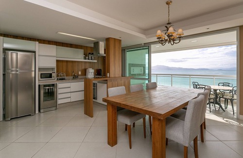 Cachoeira do Bom Jesus Apartment | SEA FRONT | Balcony with Barbecue grill #CHA06