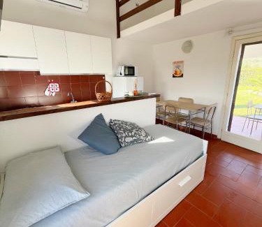 Matta 'e Peru Apartment | Seadas - Mare 2 min-Giardino-Wi-Fi-AC-Parcheggio-BBQ -Pet Friendly