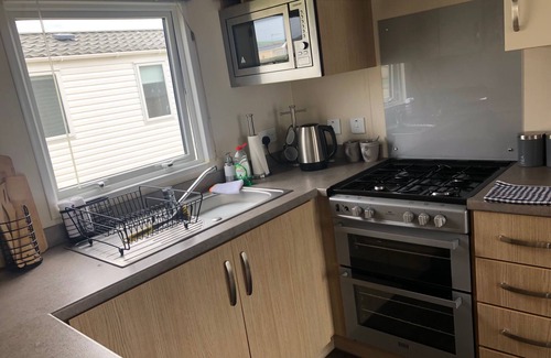 Prestatyn Cabin | Seaside 2-Bed Caravan Retreat - Sleeps 6 & Parking