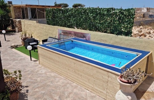 Lampedusa Condo | Seaside apartment with barbecue and outdoor furniture