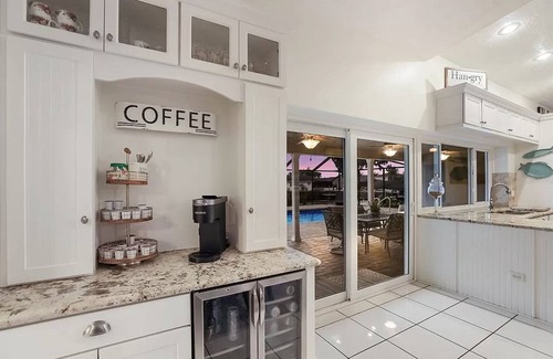 Apollo Beach House | Seaside Oasis! Dog-Friendly, Waterfront, Private Dock, Saltwater Pool & Spa,