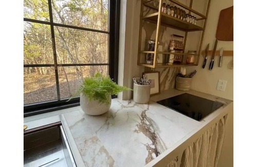 Readyville Cottage | secluded cottage- firepit, outdoor shower, hammock