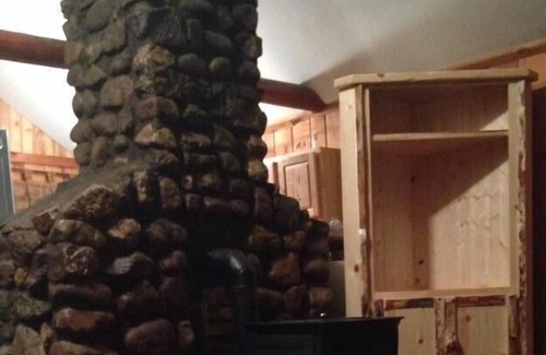 Gwinn Cabin | Secluded lake cabin on 2 acres with swimming beach, dock & sauna, new roof