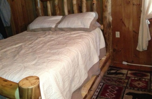 Gwinn Cabin | Secluded lake cabin on 2 acres with swimming beach, dock & sauna, new roof