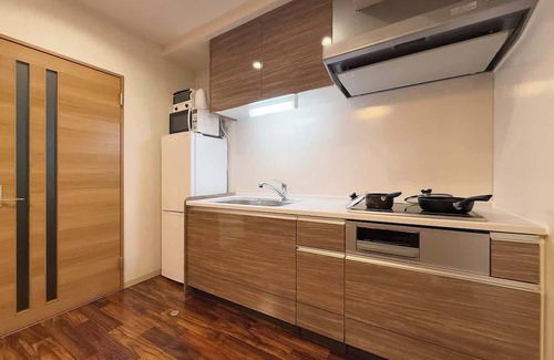Hiroshima City Centre Apartment | Secure 1BR Apt with Dining & Living Space