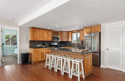 Carova Beach House | See the wild horses from your spacious 8-bedroom home in the 4x4 Carova Beach