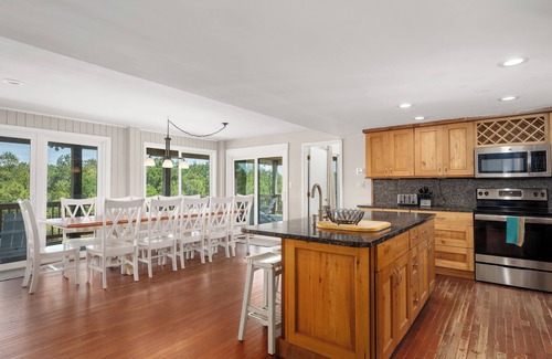 Carova Beach House | See the wild horses from your spacious 8-bedroom home in the 4x4 Carova Beach