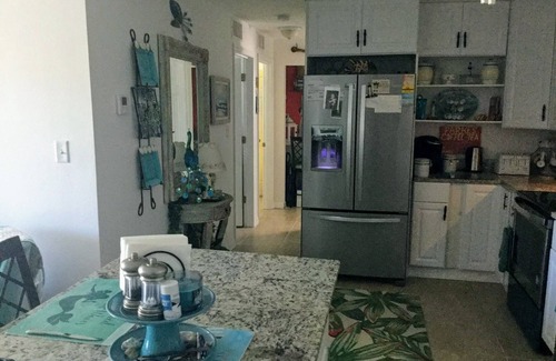 Port Canaveral Condo | Serene 2bedroom condo overlooking heated pool 1 block from Cape Canaveral beach.