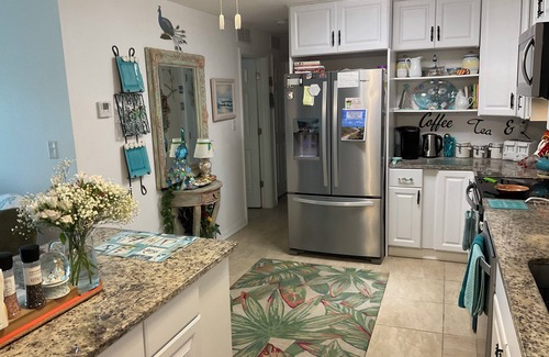Port Canaveral Condo | Serene 2bedroom condo overlooking heated pool 1 block from Cape Canaveral beach.