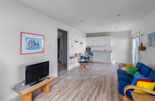 Southold House | Serene bay front home with a private beach, deck, board games, & washer/dryer