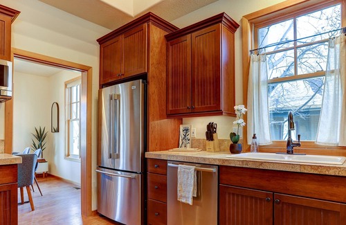 Sisters House | Serene Pine Meadow home with private hot tub! Walk to town! Views! Pool!