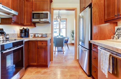 Sisters House | Serene Pine Meadow home with private hot tub! Walk to town! Views! Pool!