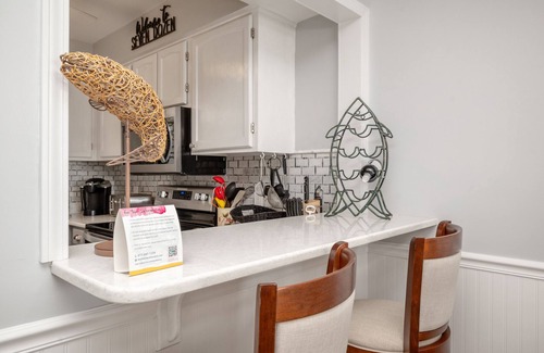 Caswell Beach Condo | Seven Dozen: Oceanfront, Caswell Beach Condo with Expansive Deck and Great Views