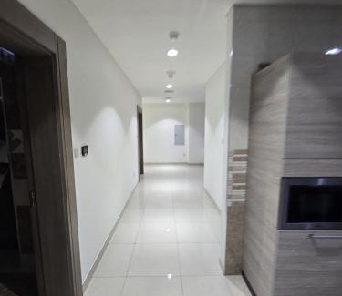 Madinat Zayed Apartment | Shared room