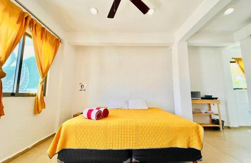 Puerto Juarez Apartment | Shark suite, 5 min walking to the beach. Shark piso2