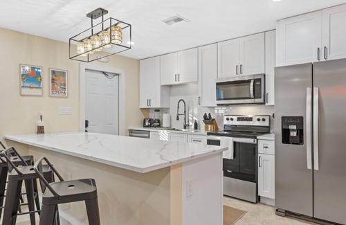 Cocoa Beach House | Shark Tank Cocoa Beach 4 2BR Units 8BR Total Each Sleeps 5 Walk to Beach