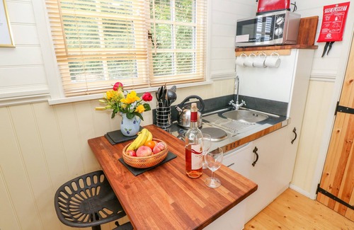 Milford Haven Cottage | SHEPHERDS HUT - THE CROOK, pet friendly, with open fire in Neyland