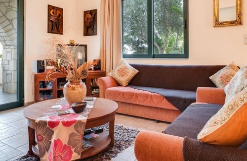 Exopoli Villa | Shiny villa Adriana into green nature overlooking Georgioupolis bay.