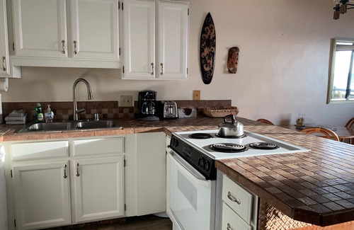 Kihei Condo | Shores of Maui #223 Great Ocean View! Near Cove Beach a Fun place to Surf!