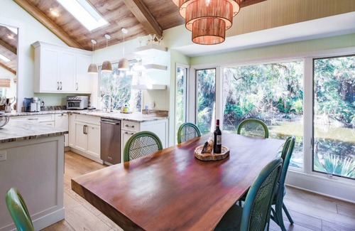 West Beach House | Short Stroll to Beach! Exquisitely Renovated Home w/Pool & Hot Tub, Spacious Deck & Lagoon Views!