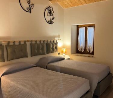 Amandola House | Sibilroom - Rooms & Wellness
