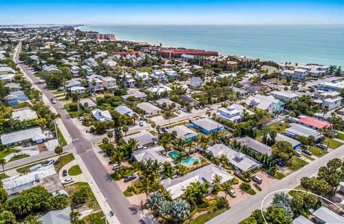 Holmes Beach House | SIMPLY CHIC: Beautiful, Remodeled, Heated Pool, Waterfall, 1.5 Blocks to Beach!!