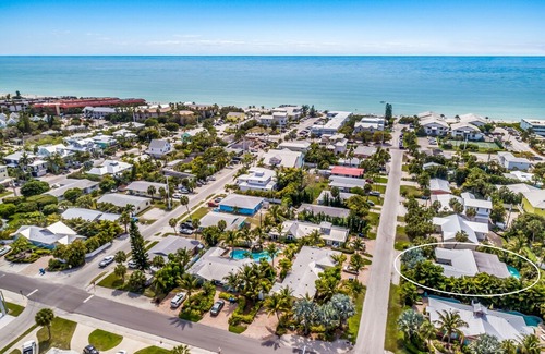 Holmes Beach House | SIMPLY CHIC: Beautiful, Remodeled, Heated Pool, Waterfall, 1.5 Blocks to Beach!!