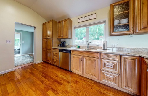 Gilford House | Single-story home overlooking Lake Winnipesaukee with firepit, fireplace & WiFi