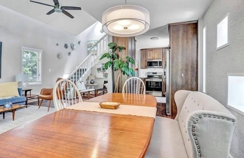 Central Colorado Springs House | Sink into the Hot Tub and start relaxing at the beautiful, bright Cedar House